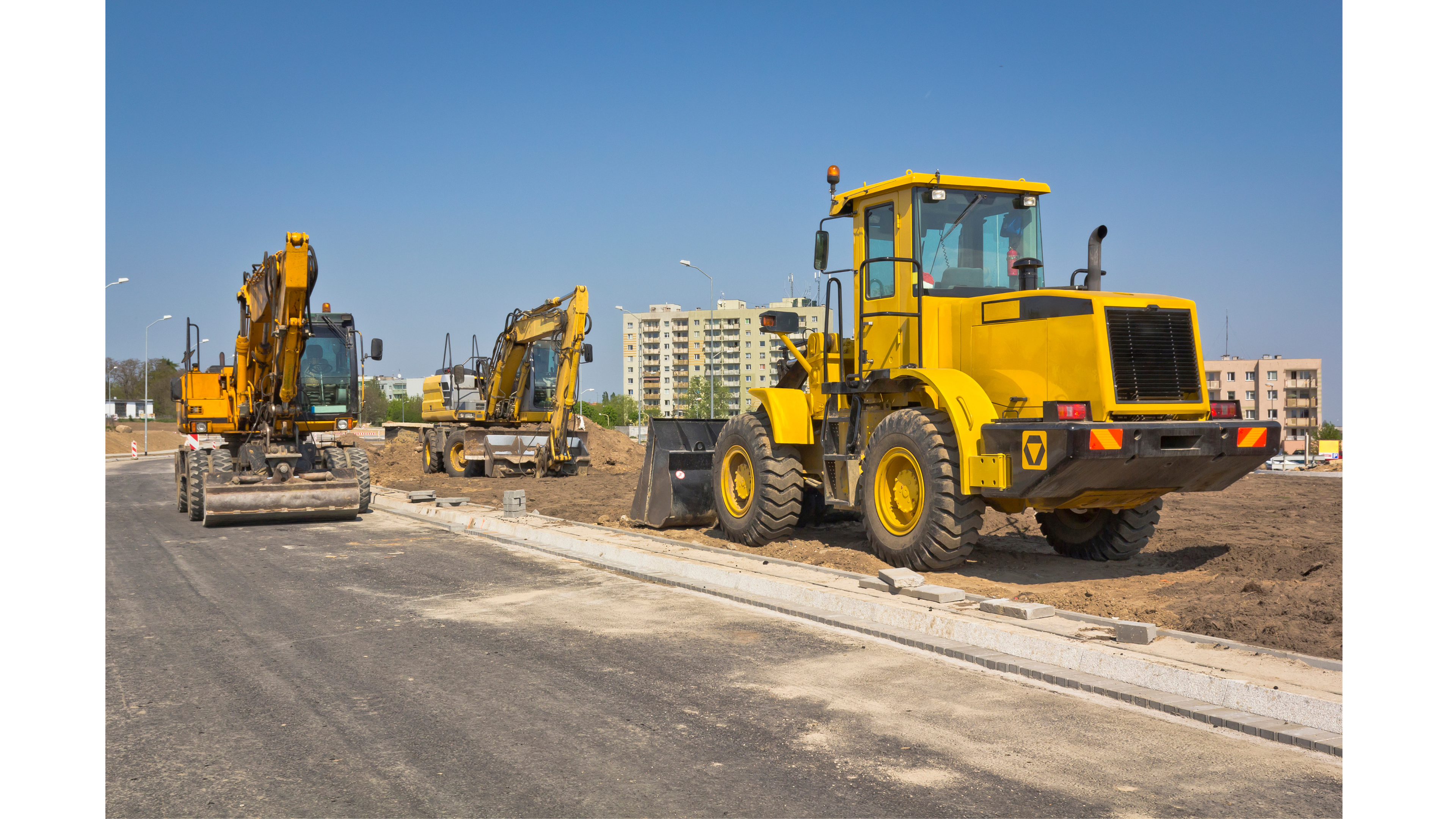 Yellow machinery on construction site